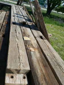 10" x 9" rough reclaimed barn wood beams made from mixed hard woods